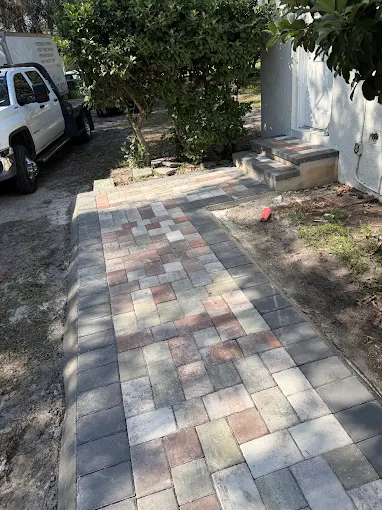 Multi-coloured paver driveway and entry steps